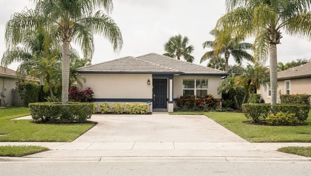 South Florida residential rental property viewed from the street, representing an asset managed on behalf of an owner who lives elsewhere